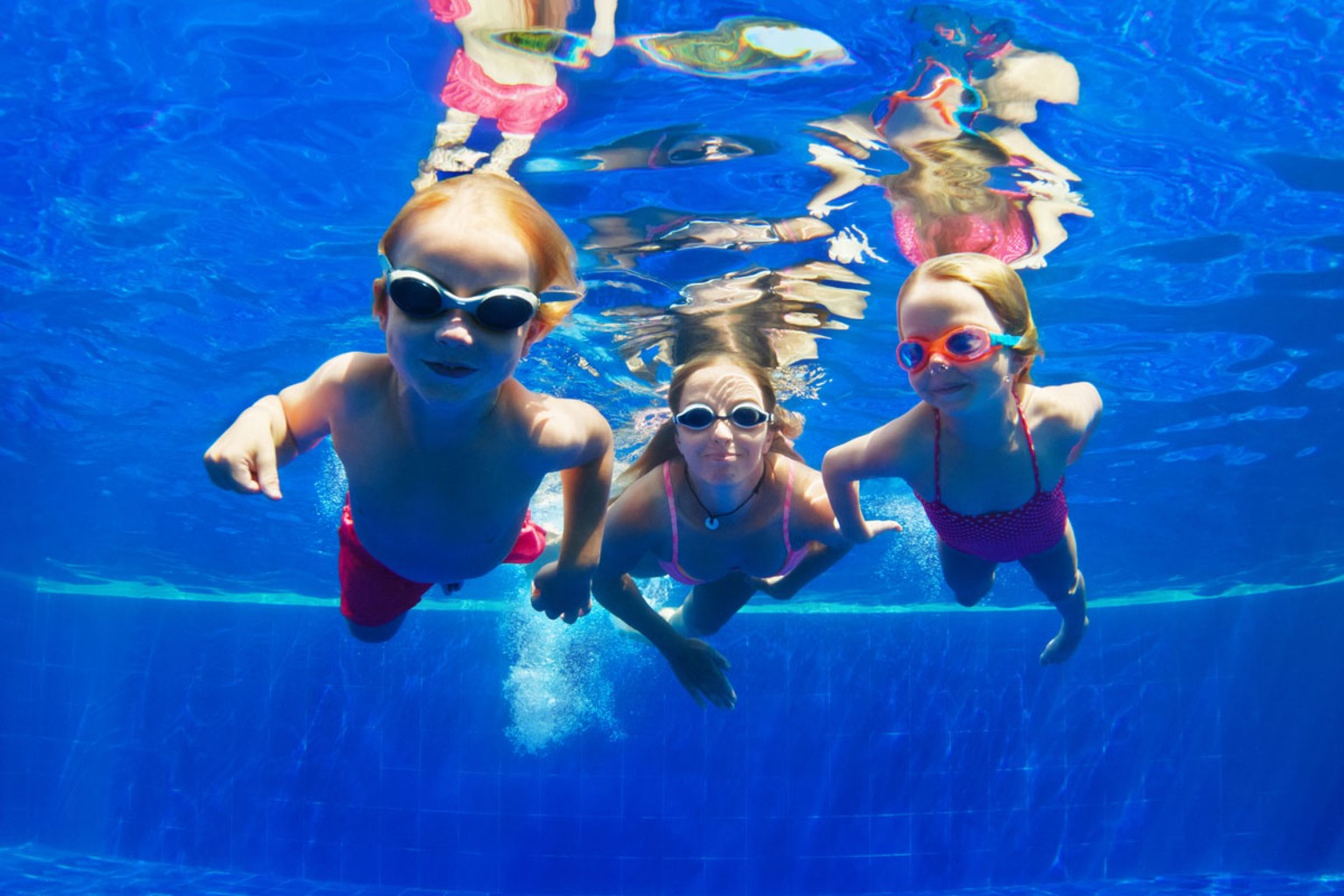 Children swimming underwater